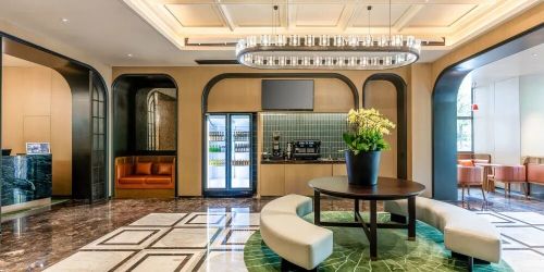 入华50年假日酒店“挖”了一条难以复制的品牌“护城河”(图11)